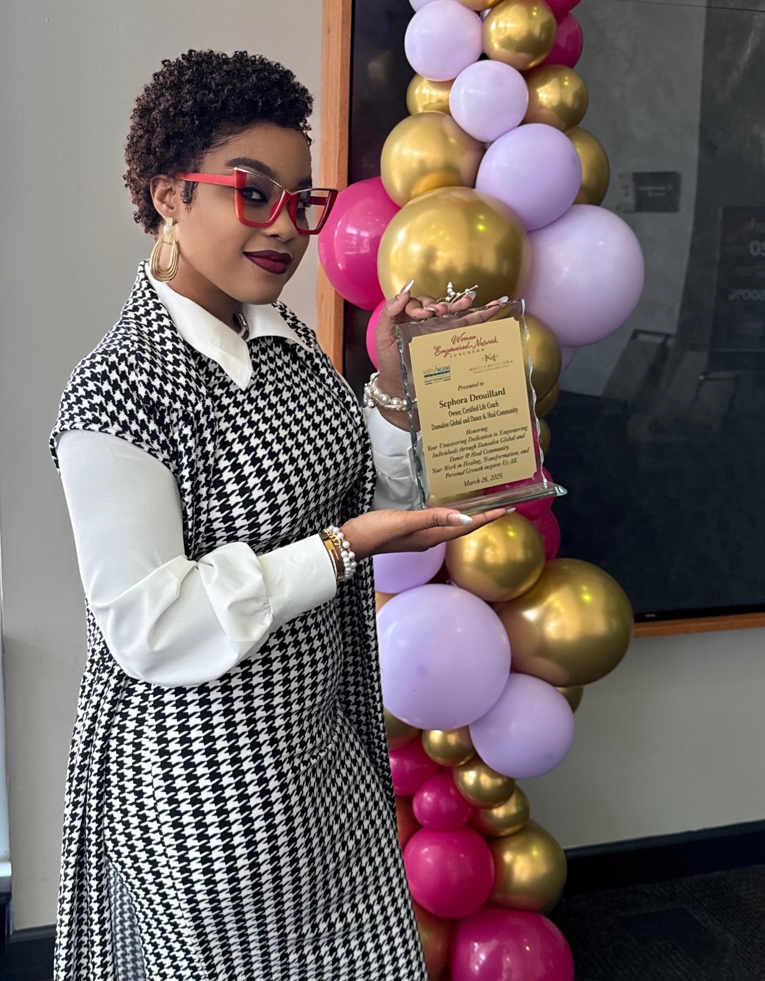Sephora holding Women Empowered Network award